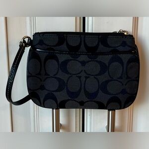 Coach Black Signature Wristlet with signature pattern